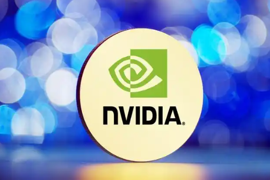 The image showcases a prominent circular emblem set against a vibrant, bokeh - filled background with hues of blue and white. At the center of the circle is the recognizable NVIDIA logo. The logo consists of a stylized, green eye - like symbol above the bold, black text "NVIDIA." The emblem appears to be a three - dimensional object, possibly a token or a coaster, with a light, off - white surface that contrasts sharply with the dynamic and colorful backdrop. The overall composition gives a sense of modernity and technological sophistication associated with the NVIDIA brand, which is well - known for its advancements in graphics processing and artificial intelligence technologies.