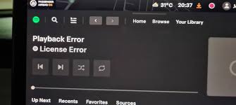 Why Am I Getting License Error Using Spotify in Tesla? How to Fix it?